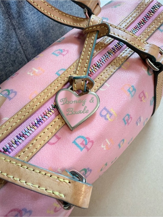 Dooney & Bourke Handbags - Y2K Dooney & Bourke Vintage Pink Barrel Bag with Heart Charm